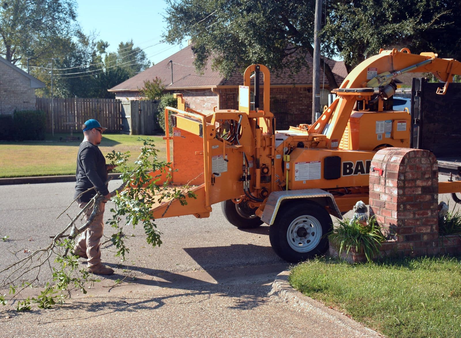 Clearing brush and branches with a wood chipper